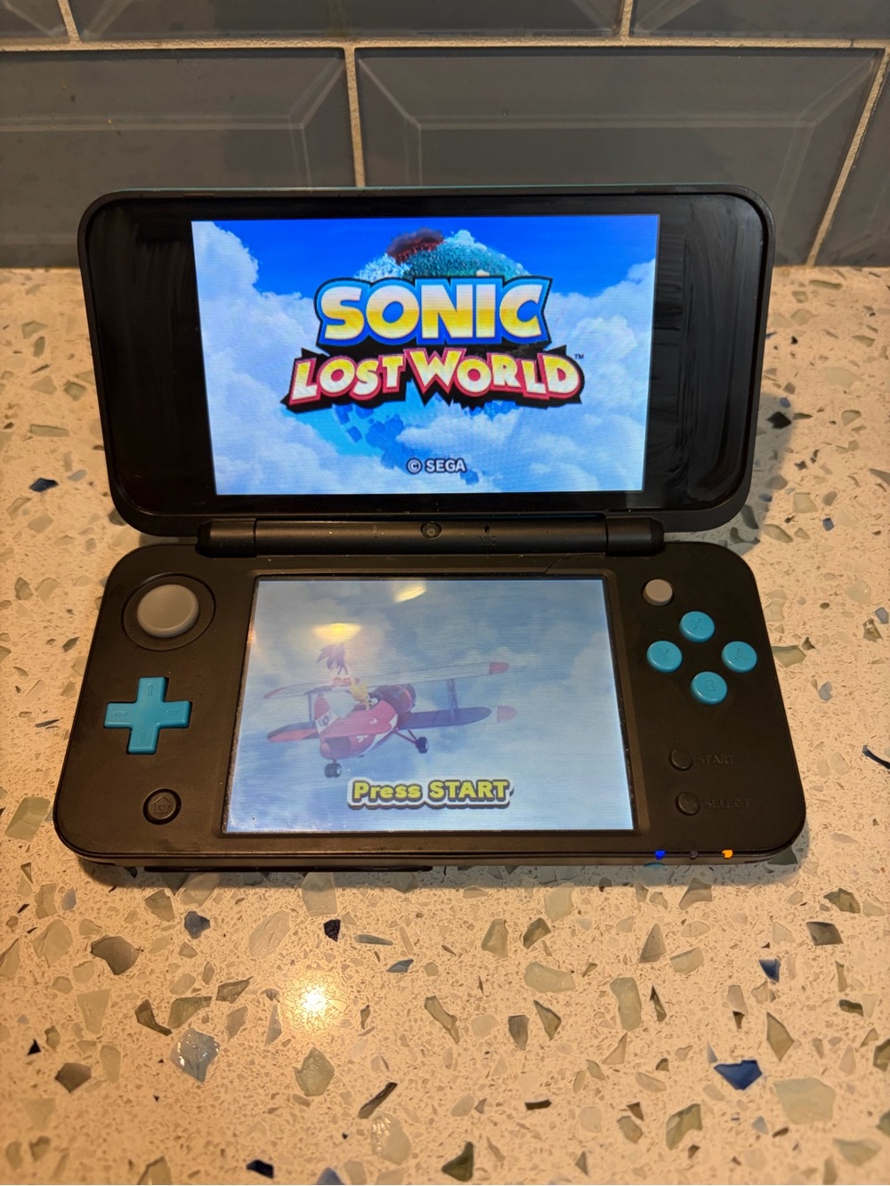 Nintendo New 2DS XL Console Black/Turquoise w/ Sonic Lost World Case Charger